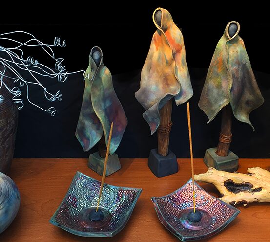 three custom ceramic figurines